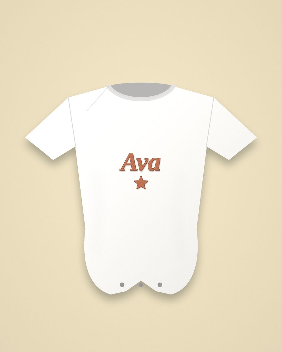 White baby bodysuit embroidered with a name and a star