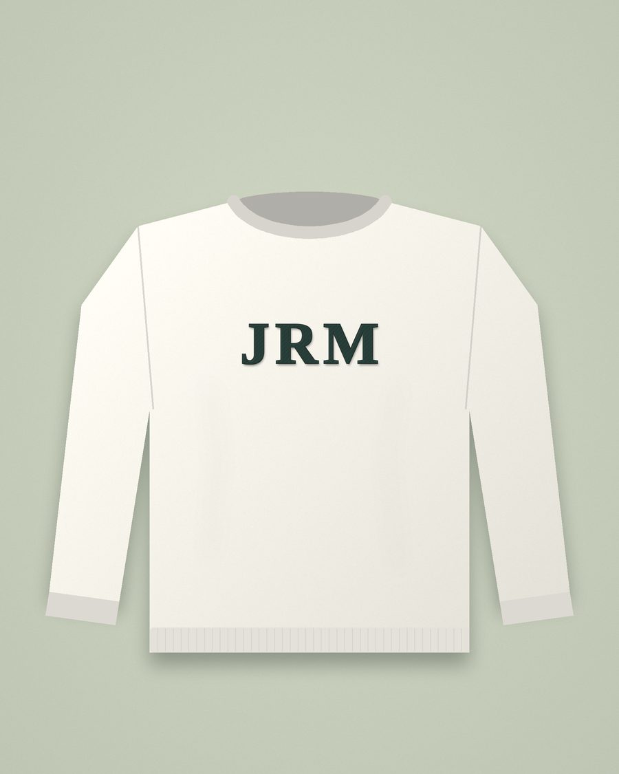 Cream crewneck sweatshirt with a stitched monogram